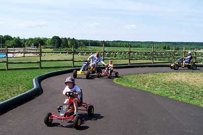 Pedal carts for kids of all ages and sizes at Lewis Farm Market, Corn Maze & Petting Zoo in New Era, Michigan, north of Grand Rapids-right dad?